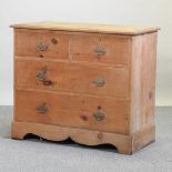 An antique pine chest of drawers,