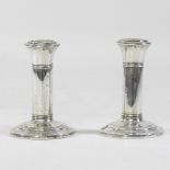 A pair of early 20th century silver dwarf table candlesticks, Birmingham 1919,