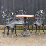 A black painted garden bench, 102cm, together with a pair of chairs,