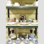 Three shelves of china,