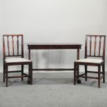 A Regency mahogany library table, 99cm, together with a pair of George III dining chairs,