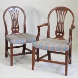 A set of six Hepplewhite style mahogany dining chairs,