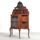 An early 20th century mahogany mirror back chiffonier, on cabriole legs,