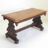 A 19th century walnut and cut card marquetry library table, on standard end supports,