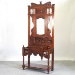 An Edwardian style mirror back hallstand,