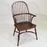 A reproduction Windsor spindle back armchair,