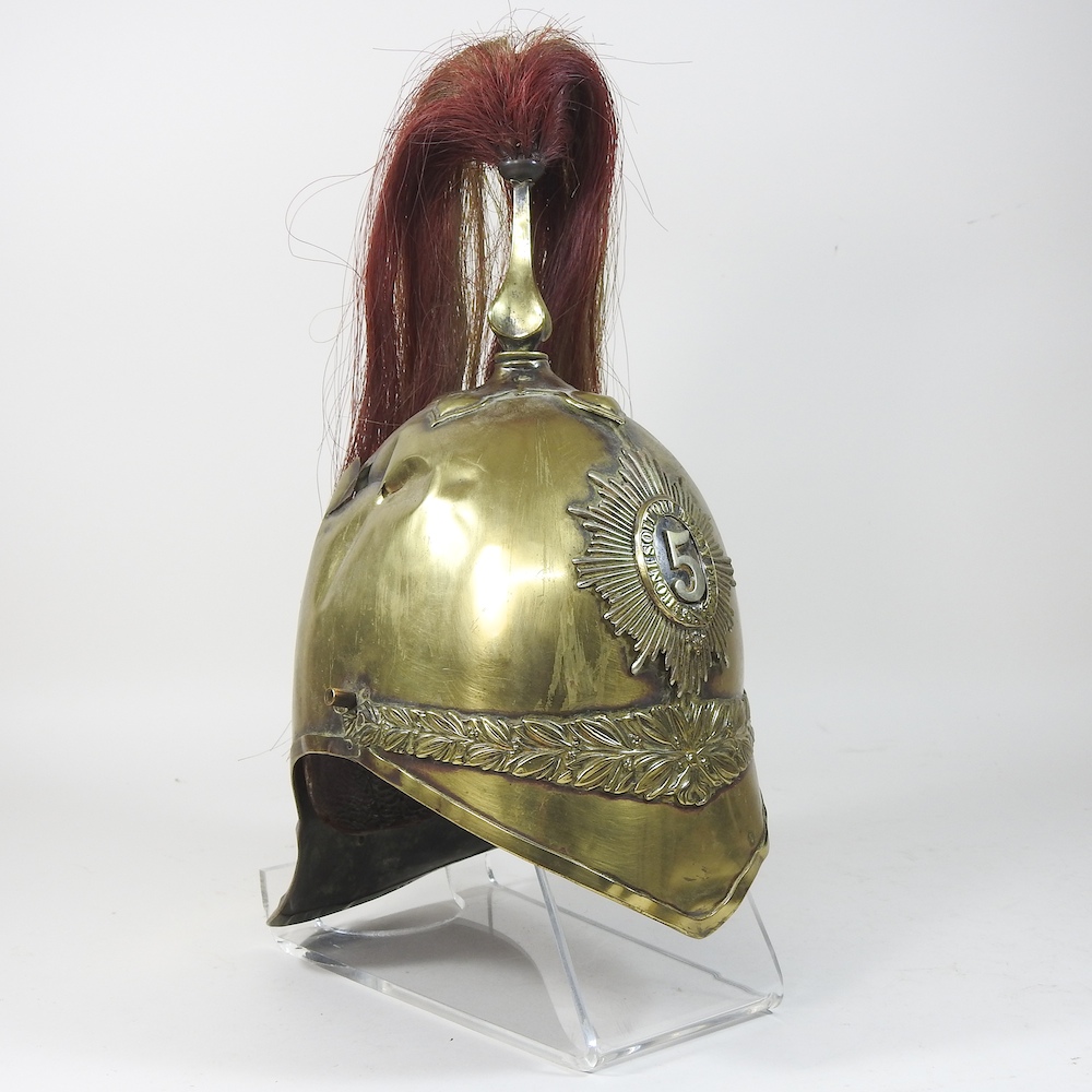 A Victorian 5th (Princess Charlotte of Wales's) Dragoon Guard's brass parade helmet, with plume,