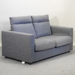 A modern Ikea grey upholstered two seater sofa,