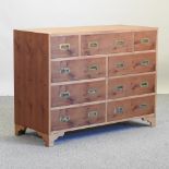 A yew wood veneered military style chest, with recessed handles,