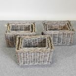 A set of three graduated wicker baskets, largest 46cm,