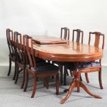 A 20th century Chinese hardwood extending dining table, 283 x 111cm,