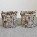 A set of three graduated circular wicker baskets, largest 49cm diameter,
