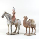 A Tang style terracotta model of a Chinese man on horseback, 51cm high,
