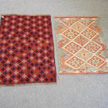 A kelim rug, with geometric design, on a blue ground, 118 x 80, together with a woollen rug,
