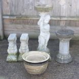 A reconstituted stone figural bird bath, 88cm high, together with a sundial, two garden pots,