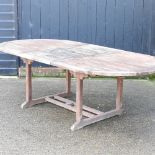 A hardwood extending garden table,