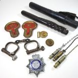 An early 20th century policeman's truncheon, 37cm long, in a leather case,