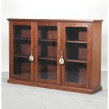 A Victorian style cherrywood glazed dwarf bookcase,