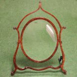 An early 19th century swing frame toiletry mirror,