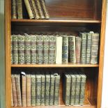 A collection of 19th century and later leather bound books,