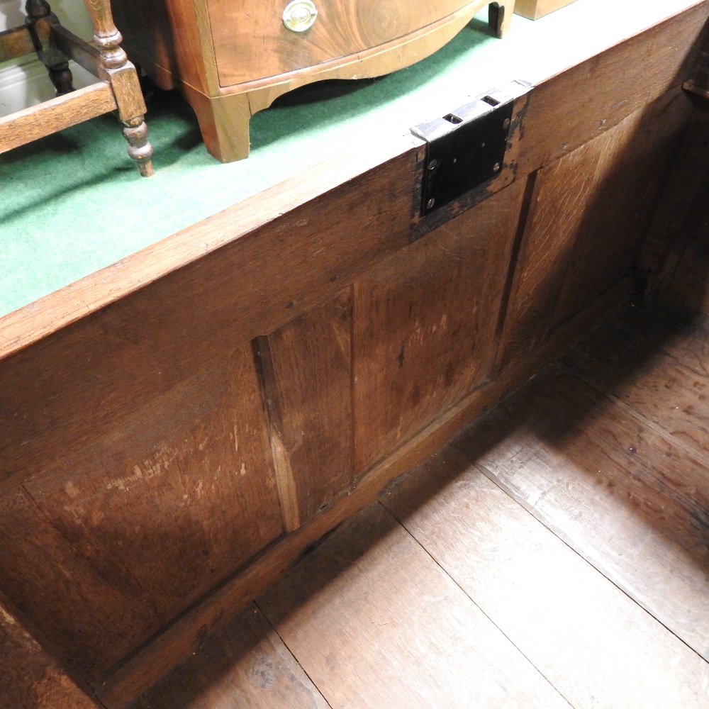 An 18th century and later carved oak coffer, - Image 13 of 15