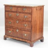 An 18th century and later walnut and crossbanded chest, on bracket feet, 81cm.