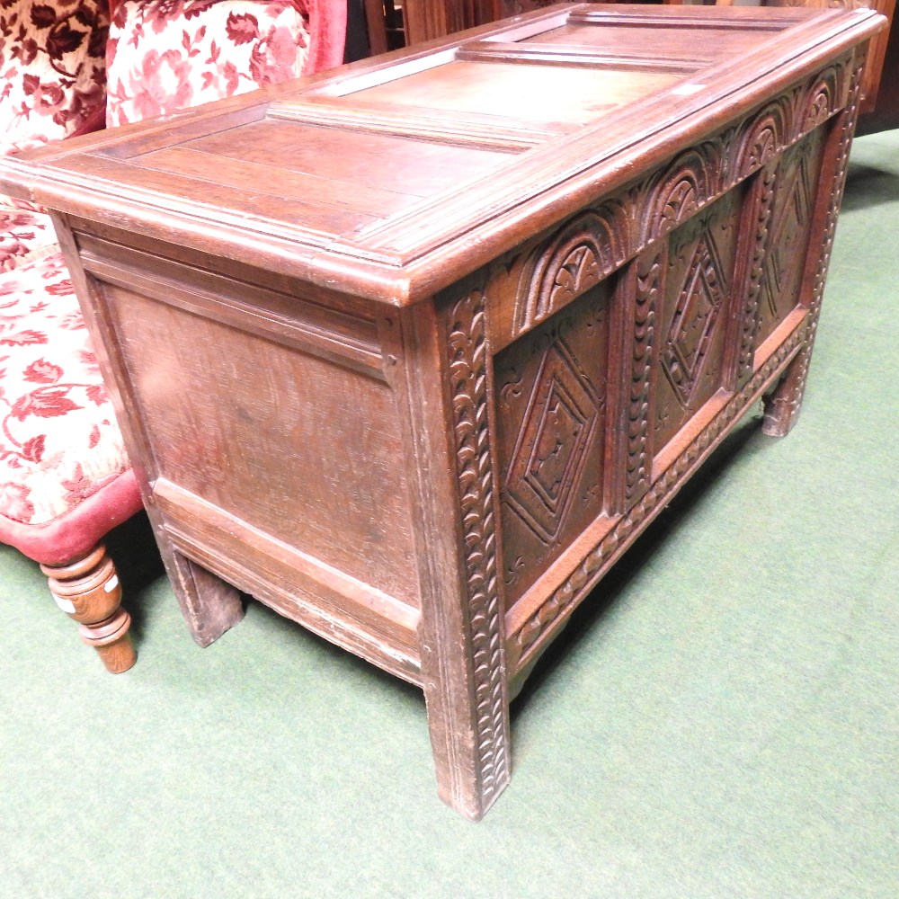 An 18th century and later carved oak coffer, - Image 15 of 15