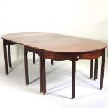 A George III mahogany D end dining table, with a removable central section,