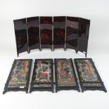 A 20th century Chinese reverse painted glass screen, decorated with figures, 68cm high,
