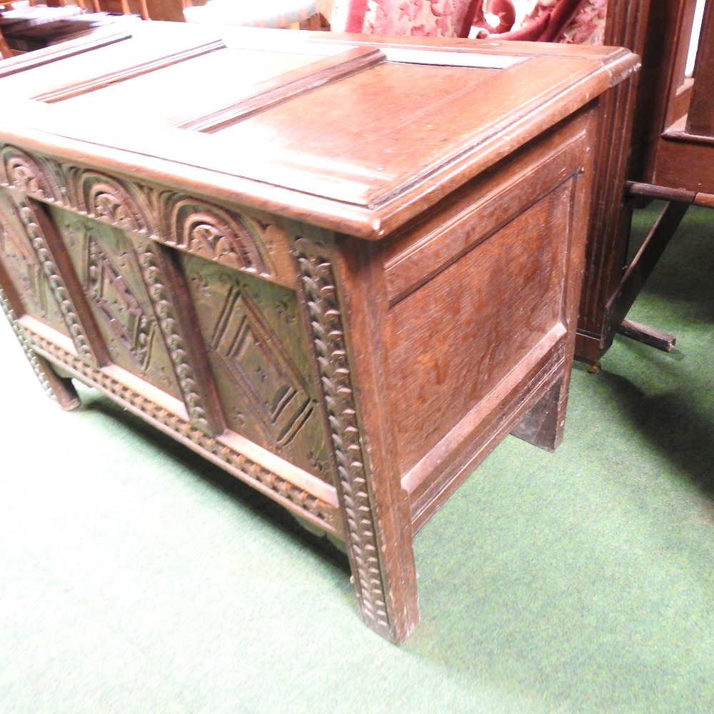 An 18th century and later carved oak coffer, - Image 14 of 15