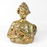 A 20th century gilt bronze portrait bust of a lady, holding fruit,