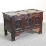 An 18th century and later oak coffer,