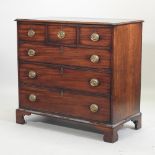 A George III mahogany chest of drawers, on bracket feet,