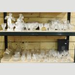 Three shelves of glassware, to include Stuart crystal vase, boxed, decanters,