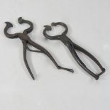 A pair of Georgian steel sugar cutters, together with another pair,