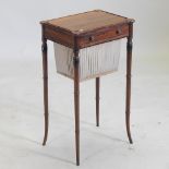 A Regency mahogany and ebony inlaid work table, on splayed legs,