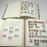Three stamp albums of early 20th century and later mainly British Empire stamps,