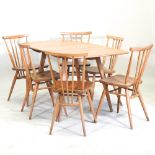 A 1970's Ercol light elm drop leaf dining table, 137 x 74cm,