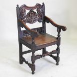 An 18th century and later carved oak wainscot chair
