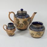 A 19th century Doulton Lambeth salt glazed stoneware three piece tea service, with silver mounts,