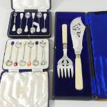 A set of six early 20th century silver bean terminal coffee spoons, cased,