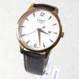 A Tissot gentleman's wristwatch, on a brown leather strap,
