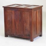 An early 20th century panelled oak coffer,