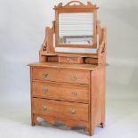 An Edwardian satin walnut dressing chest,