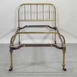 A Victorian brass single bedstead,