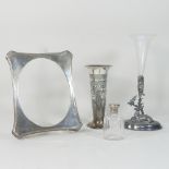 An early 20th century silver trumpet shaped vase, 19cm high,