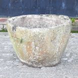 A marble mortar, of large proportions,