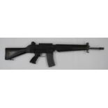 Deactivated Sterling Assault Rifle 5.56 mm, 19 3/4 inch, blackened barrel with front flash hider.