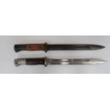 Two Imperial German Seitengewehr M84/98 Bayonets 10 inch, single edged blades. Large fullers. One