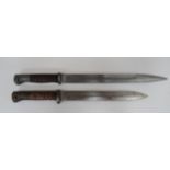 Two Various Imperial German Bayonets consisting M1884/98 example. 10 inch, single edged blade.